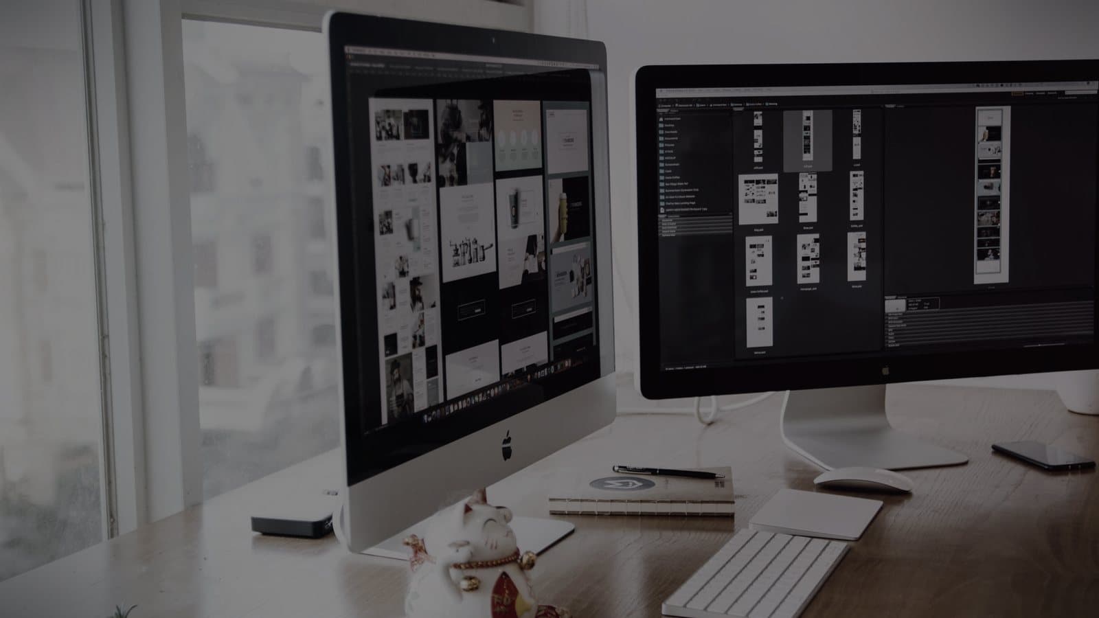 A desktop monitor displaying a website in a bright workspace